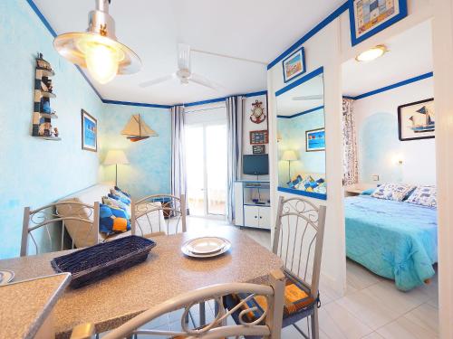 A bed or beds in a room at Apartment Club Nautic-17 by Interhome