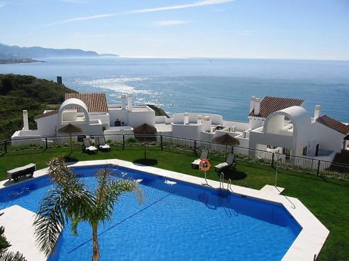 Swimming pool sa o malapit sa Apartment 3 bedrooms in Torrox Coast by Interhome