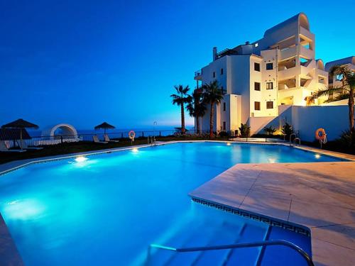 Swimming pool sa o malapit sa Apartment 3 bedrooms in Torrox Coast by Interhome