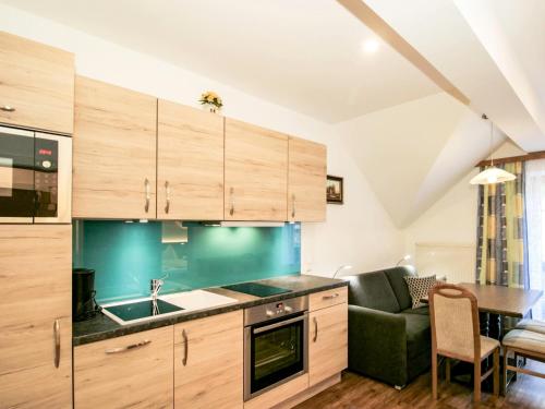 Kuchyň nebo kuchyňský kout v ubytování Apartment Almsommer by Interhome