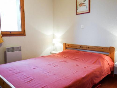 En eller flere senge i et værelse på Apartment Les Pistes-19 by Interhome