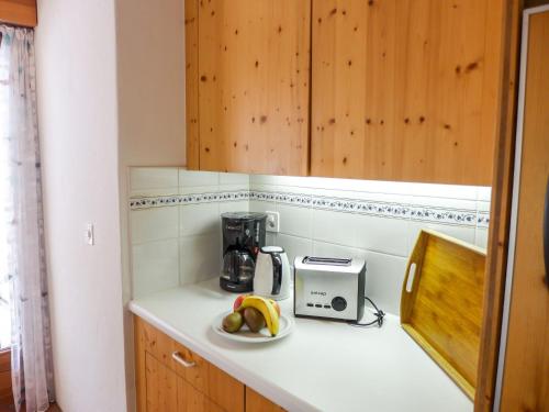 Apartment Chesa Maurus A12 by Interhome