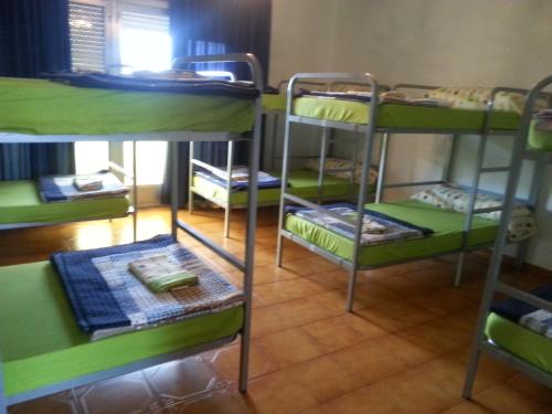 Katil atau katil-katil dalam bilik di Albergue Pensión Flavia