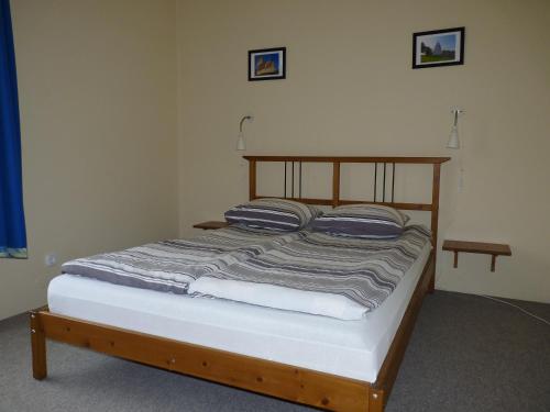 Postel nebo postele na pokoji v ubytování Dorka vendégház