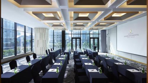 a conference room with black tables and chairs at Grand InterContinental Seoul Parnas by IHG in Seoul