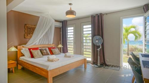 Una cama o camas en una habitación de Villa LABARQUE 2