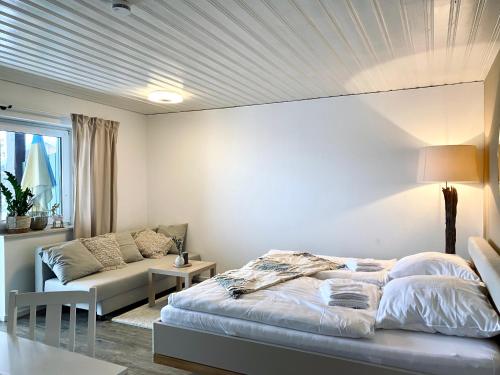 Tempat tidur dalam kamar di Ferienwohnung „Bergzeit“