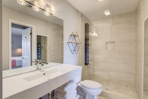 a white bathroom with a sink and a toilet at 7F Nama-Stay in Destin