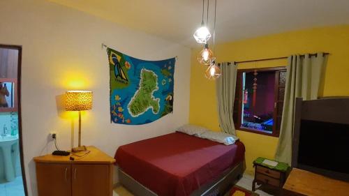 En eller flere senge i et værelse på Flat Filtro Dos Sonhos