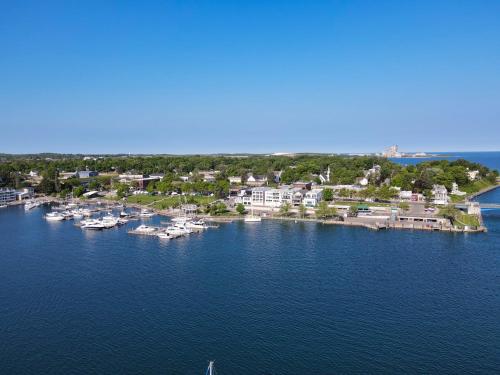 an aerial view of a harbor with boats in the water at 343 Edgewater Inn in Charlevoix
