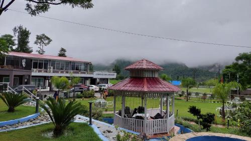a gazebo in the yard of a resort at Cordillera Resort in Hassa