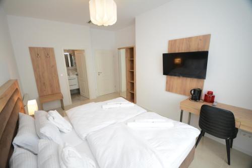 Letto o letti in una camera di Hannover Zimmervermietung Mardino