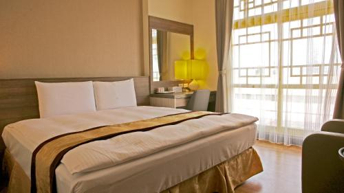 Lishan Guest Houseにあるベッド