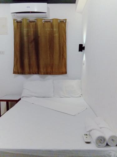 Postel nebo postele na pokoji v ubytování Jalyn's Resort Sabang