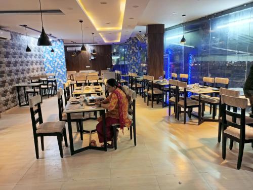 A restaurant or other place to eat at The Jamun Tree