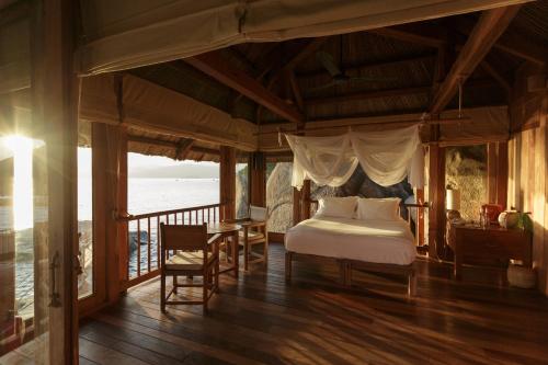 Кровать или кровати в номере Six Senses Ninh Van Bay