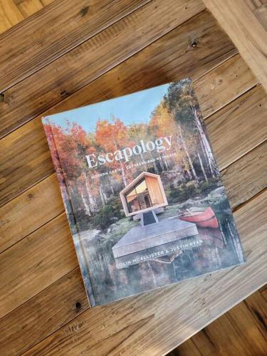 a magazine on top of a wooden table at The Davis Loft in Davis