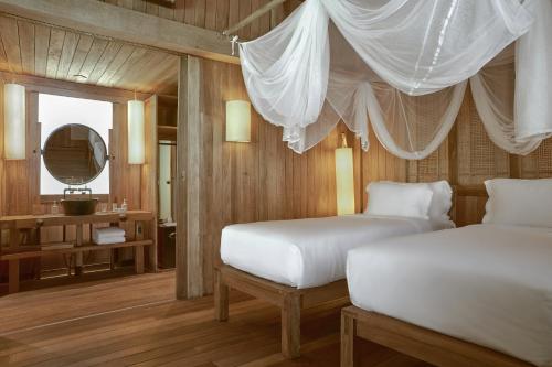 Кровать или кровати в номере Six Senses Ninh Van Bay
