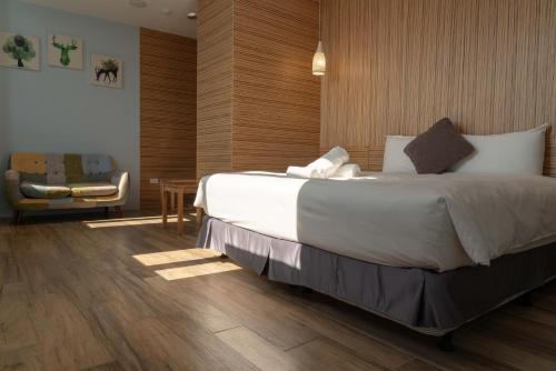 Una cama o camas en una habitación de HUA B&B