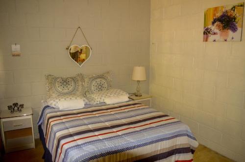 Postel nebo postele na pokoji v ubytování Apartamento El Verdor Hacienda Lopez Espino
