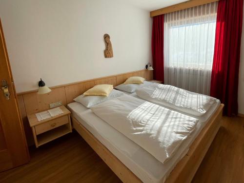 Postel nebo postele na pokoji v ubytování Residence Lastei
