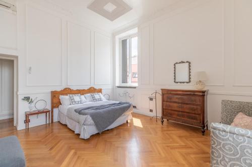 Cama o camas de una habitación en iFlat Unforgettable in front of Colosseum