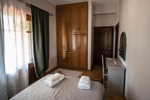Ένα ή περισσότερα κρεβάτια σε δωμάτιο στο Villa Belvedere