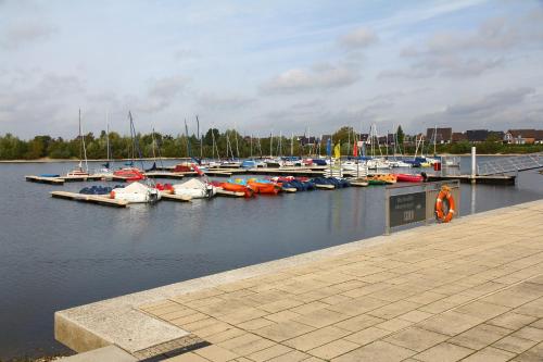 a bunch of boats are docked in a marina at Landlust Unser L ieblingscafe in Xanten