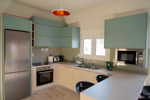 A kitchen or kitchenette at Ierapetra flats