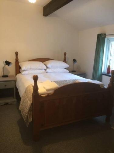 Postelja oz. postelje v sobi nastanitve Dalesway cottage