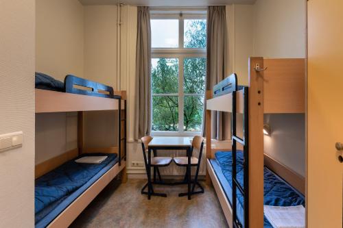 Een stapelbed of stapelbedden in een kamer bij Stayokay Hostel Utrecht - Bunnik 