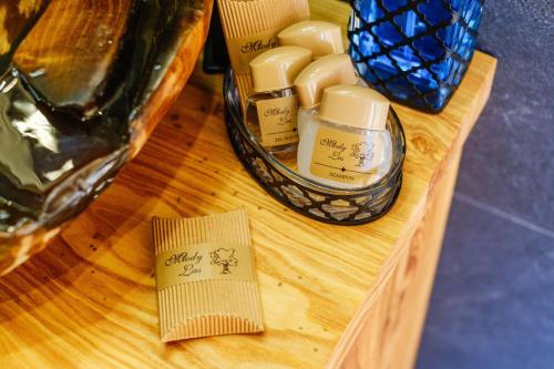 a wooden table with someentalentalental products on it at Domek Leśny in Zakopane