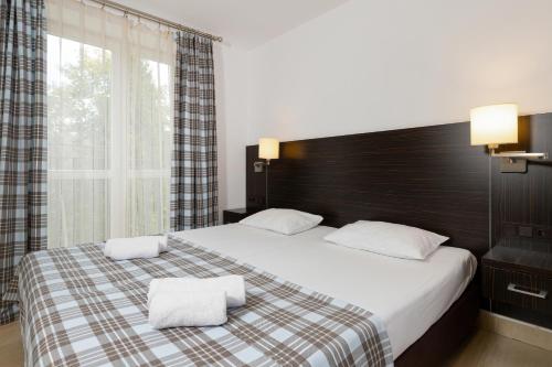 Cama o camas de una habitación en Poniwiec Mała Czantoria