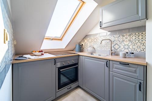 Dapur atau dapur kecil di Apartamenty Nad Niwką