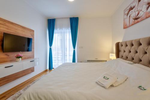 Ένα ή περισσότερα κρεβάτια σε δωμάτιο στο Apartman Mitic, Zlatibor