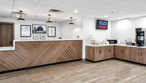 a fast food restaurant with a counter in a room at Atria Hotel and RV McGregor in McGregor