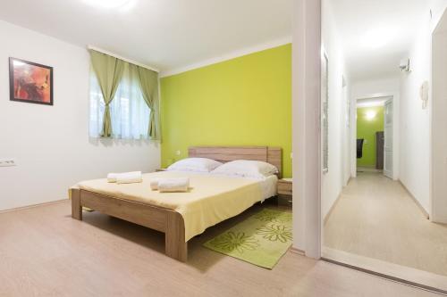 Voodi või voodid majutusasutuse Apartment Jasmin toas