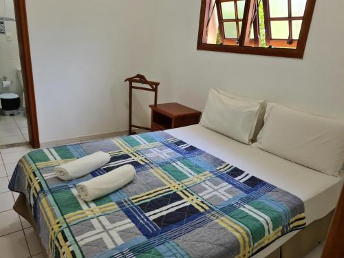 מיטה או מיטות בחדר ב-Pousada Appaloosa