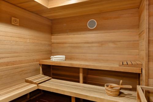 a wooden sauna with a wooden bench in it at Standard Two Bedroom - Aspen Alps #207 in Aspen