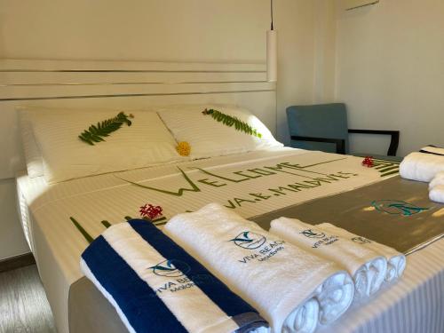 Postel nebo postele na pokoji v ubytování VIVA Beach Maldives