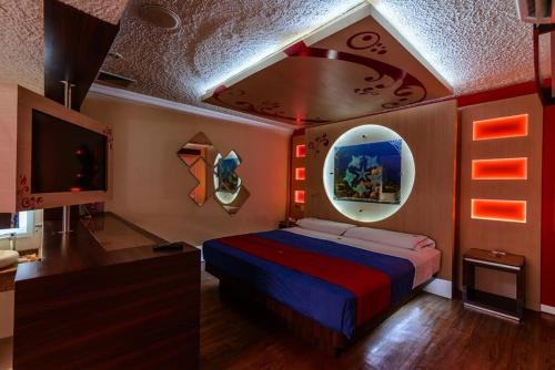 Postel nebo postele na pokoji v ubytování Motel Primavera