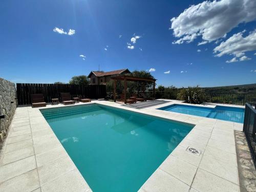 Πισίνα στο ή κοντά στο Parque Los Nogales Apart Hotel