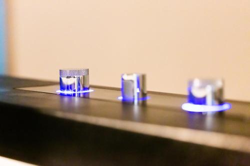 a close up of three drinking glasses on a counter at Loft mit Whirlpool Sauna Kino nähe Wolfsburg in Helmstedt