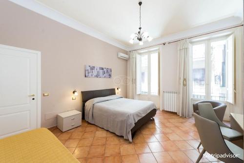 En eller flere senge i et værelse på A Casa di Anna - Apartment