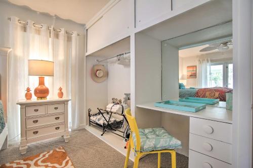 a bedroom with a bunk bed and a mirror at 1 Mi to Deerfield Beach Home with Outdoor Oasis! in Deerfield Beach