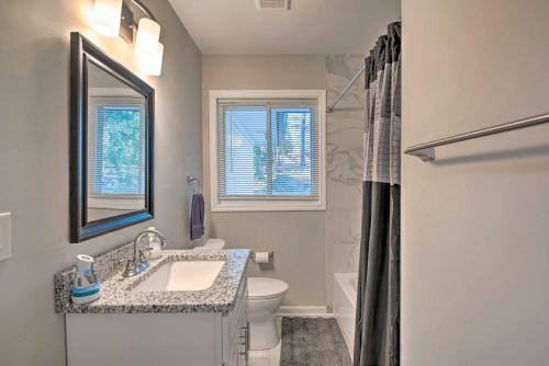 a bathroom with a sink and a toilet and a shower at Central Location! World Cup ATL HQ 5 Mi to Stadium in Atlanta