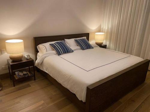Postel nebo postele na pokoji v ubytování Luxury new apartment in Cap Cana Punta Cana