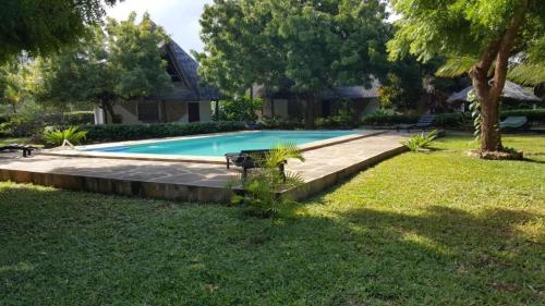 The swimming pool at or close to Watamu Eco Villas