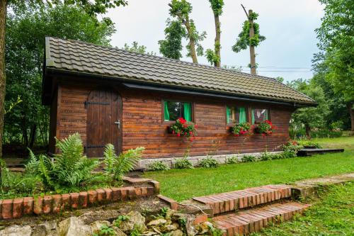 Κήπος έξω από το Jurajska Sielanka - domek nad rzeczką