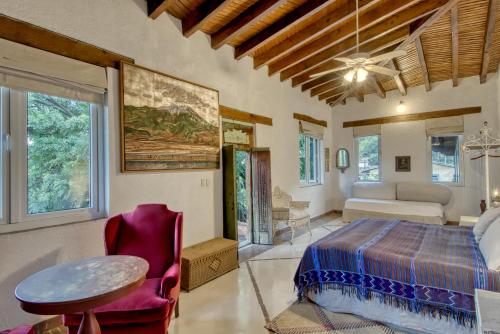 Una cama o camas en una habitación de Quinta Cielo - Hotel Boutique y Restaurante